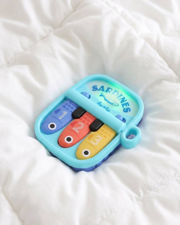 Bitzy Tunes™ Sardines | Light-up Interactive Piano Toy