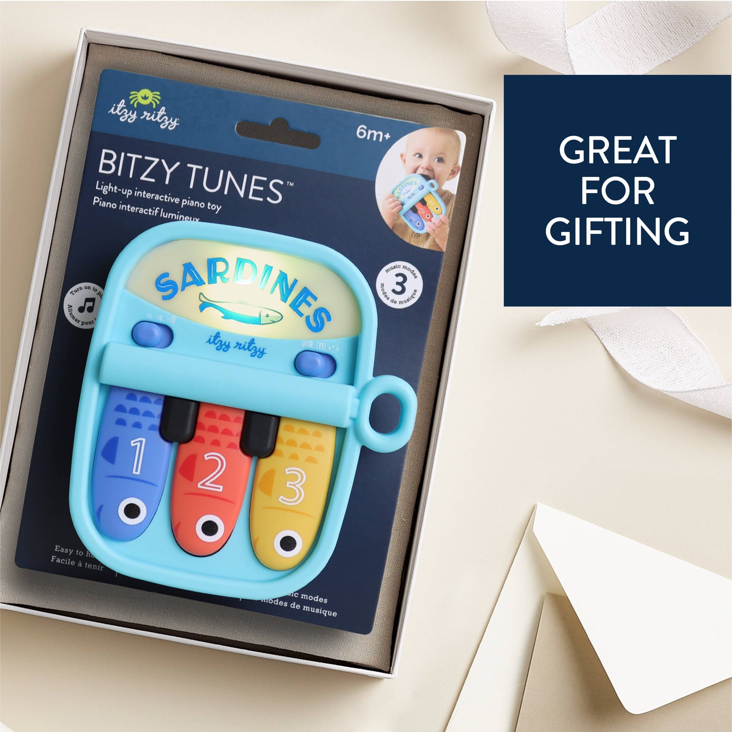 Bitzy Tunes™ Sardines | Light-up Interactive Piano Toy
