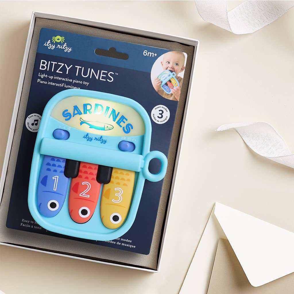 Bitzy Tunes™ Sardines | Light-up Interactive Piano Toy